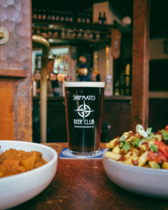 Pint of Ale with loaded fries